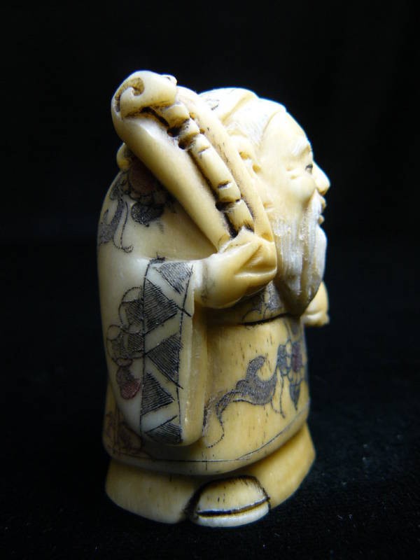 ANTIQUEBone JAPANESE NETSUKE: Japanese Netsuke. All Hand Carved From One Solid Piece Of Bone. Hand Painted With Signature On The Bottom. There Are 2 Holes On The Back, Which Is Used For Hanging. Very Detailed.___Long: 1.5", Deep: 