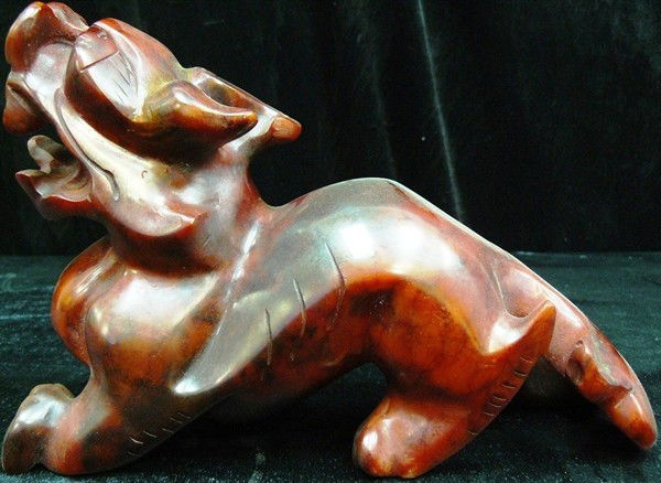 JADE ANCIENT PIXIU / KYLIN: JADE ANCIENT PIXIU / KYLIN - SIZE: LONG 10", DEEP 3.5", HIGH 6.5" - Is An Ancient Chinese Creature Named Pixiu Or Kylin. It Is Made From One Solid Piece Of Jade. It Appears Deep Red With Some Areas Bl