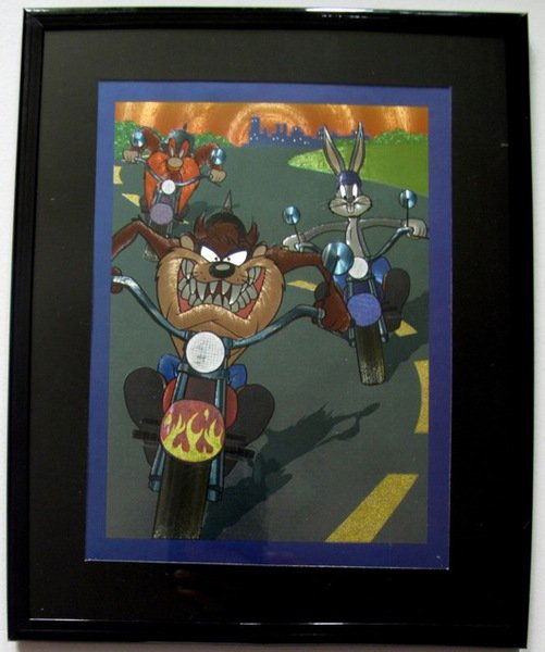 LOONEY TUNES TAZ YOSEMITE SAM BUGS BUNNY MOTORCYC: This Is A Warner Bros Looney Tunes Framed Foil Art. This Fantastic Animation Features Yosemite Sam, Taz, & Bugs Bunny Riding Motorcycles As They Appeared In The 1970's Cartoons. This Beautifully Frame