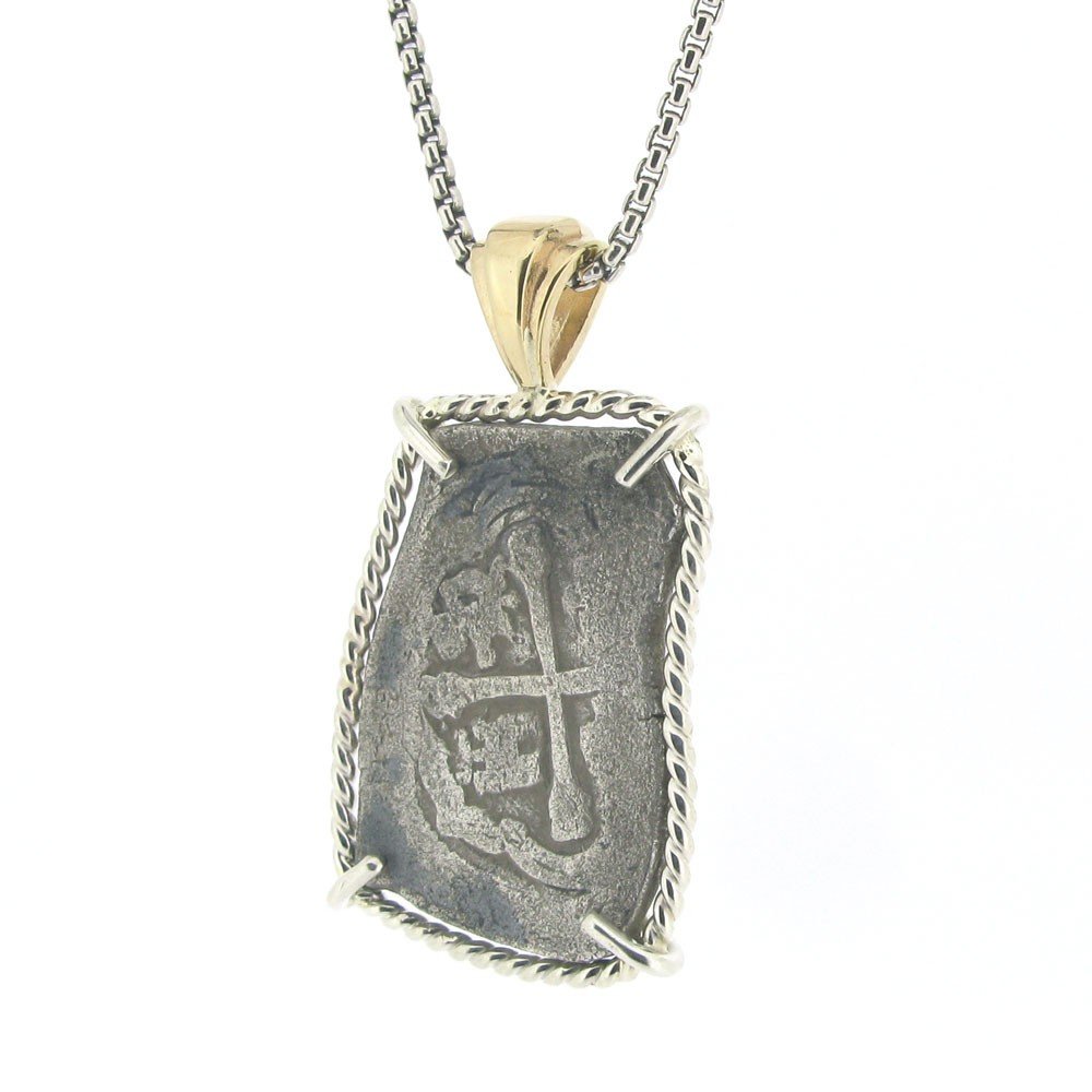 A SPANISH COB COIN FROM THE 1600'S: This Pendant Features A Spanish 4 Reale Coin Minted Under The Reign Of Philip Iii (Circa 1600). The Front Of The Coin Features A Well-Defined Cross On The Shield Of Castile And Leon, While The Reverse