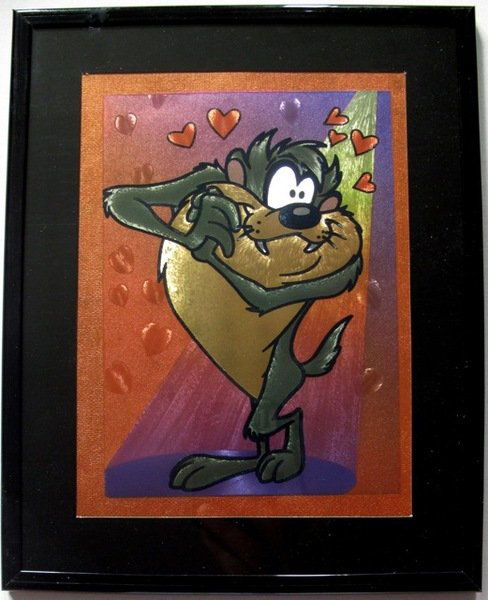 LOONEY TUNES TAZ IN LOVE FRAMED FOIL ART: This Is A Warner Bros Looney Tunes Framed Foil Art. This Fantastic Animation Features Taz The Tasmanian Devil In Love As He Appeared In The 1970's Cartoons. This Beautifully Framed And Matted Art Piec