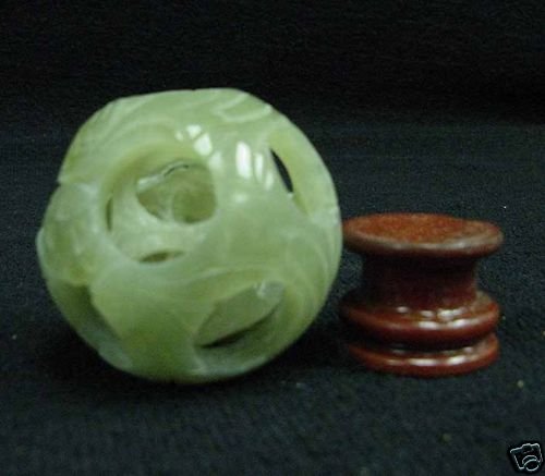 REAL JADE 3 LAYER PUZZLE BALL: REAL JADE 3 LAYER PUZZLE BALL - This Wonderful Piece Of Work Is Made Of Real Jade. In One Piece Of Solid Jade, We Carved In A Few Layers And It Is Carved From Inside Out. The Most Interesting Part Of 
