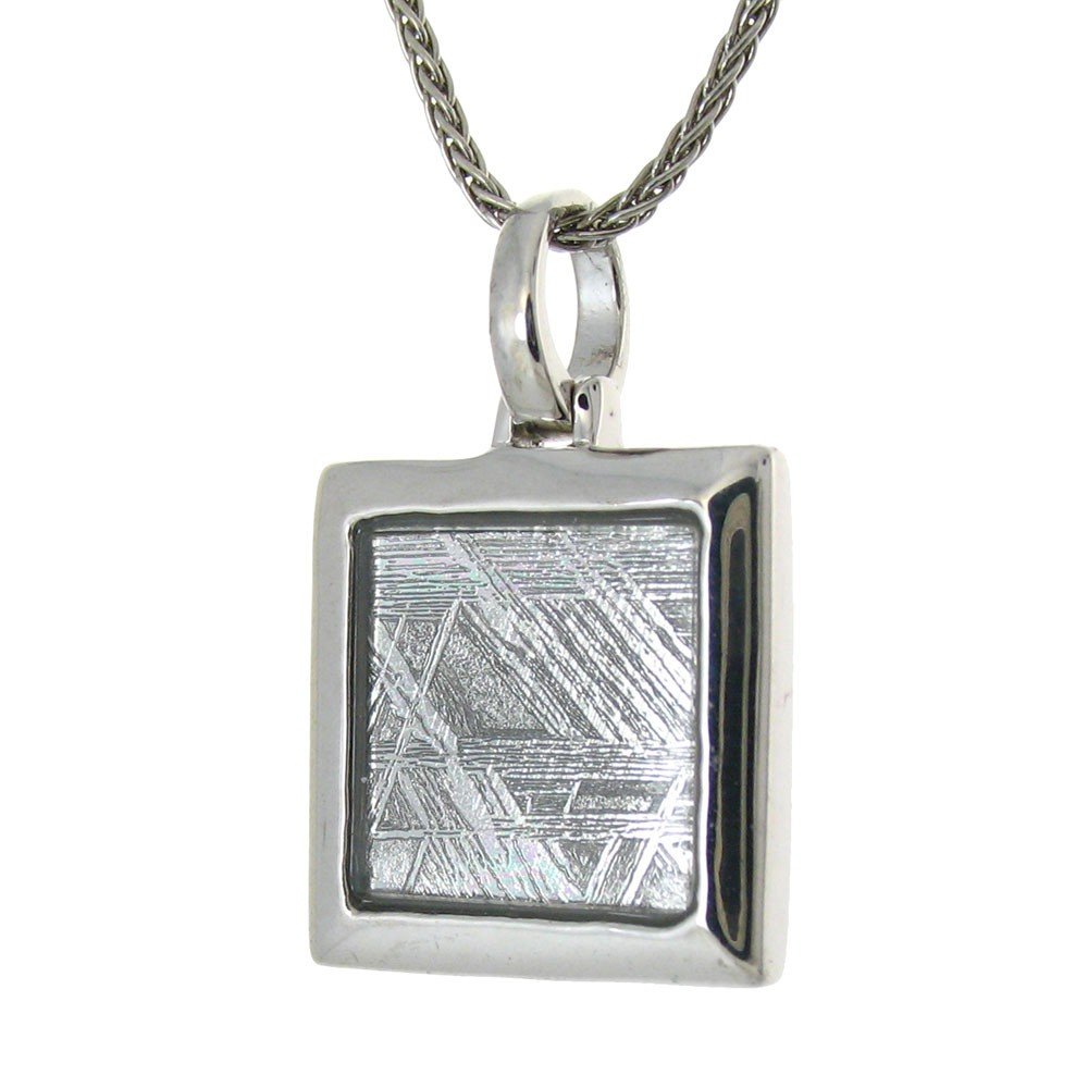 A SMALLER GIBEON METEORITE: In Answer To Requests For A Smaller Size Gibeon Meteorite Designer Came Up With This Design. Measuring Slightly Less Than One Inch Square, It Has The Vivid Widmanstatten Crystalized Patterns Only Seen