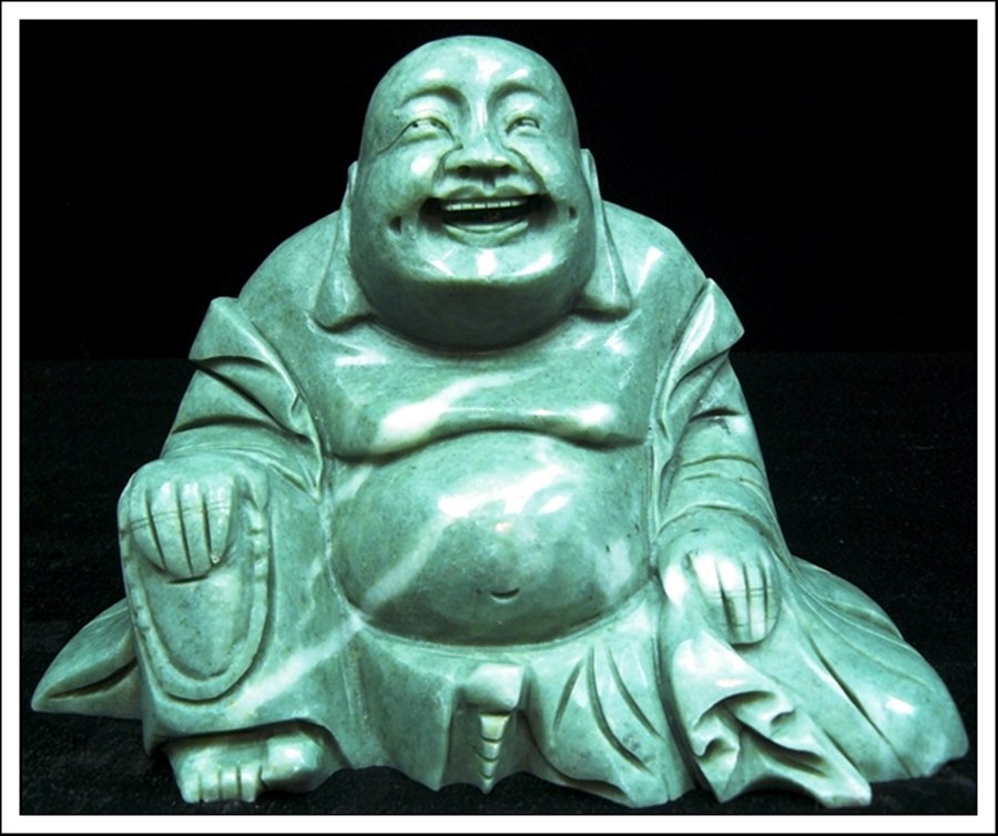 JADE SITTING BUDDHA: JADE SITTING BUDDHA - This Buddha Is Made From One Solid Piece Of Southern Jade. Light Green With Some Spots Dark Green. Very Detailed Carving. - Wide: 7", Deep: 3", High: 5".