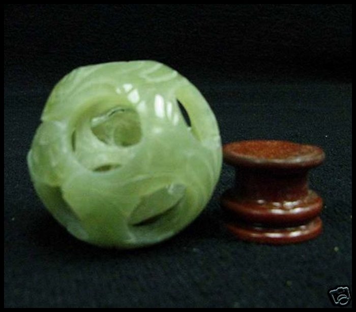 REAL JADE 3 LAYER PUZZLE BALL: Real Jade 3 Layer Puzzle Ball - This Wonderful Piece Of Work Is Made Of Real Jade. In One Piece Of Solid Jade, We Carved In A Few Layers And It Is Carved From Inside Out. The Most Interesting Part Of 