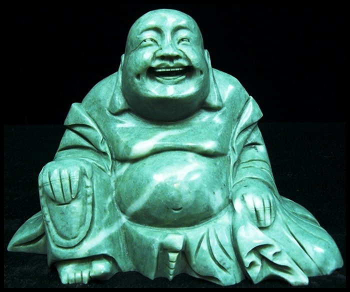 JADE SITTING BUDDHA: Jade Sitting Buddha - This Buddha Is Made From One Solid Piece Of Southern Jade. Light Green With Some Spots Dark Green. Very Detailed Carving. - Wide: 7", Deep: 3", High: 5".