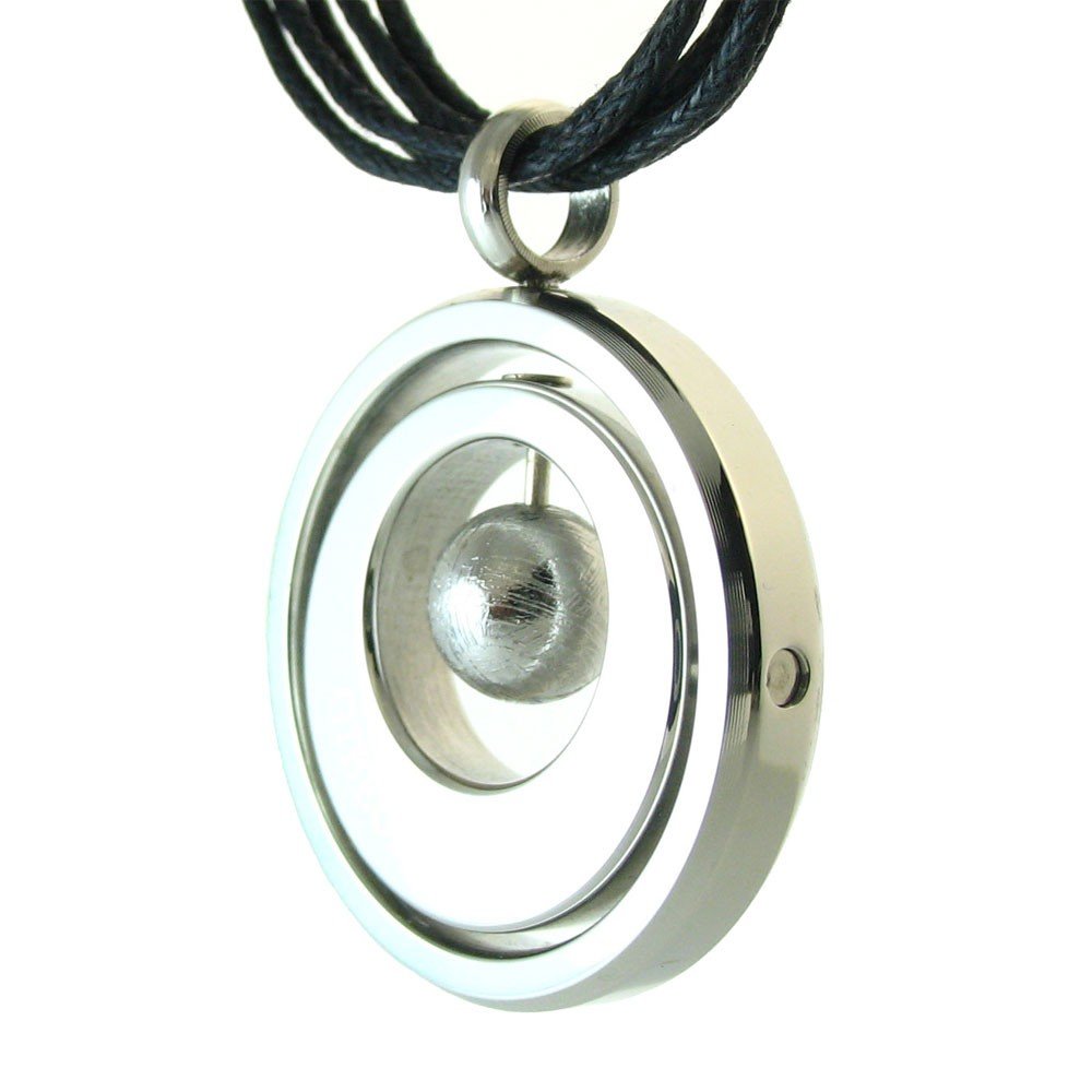 Meteorite in Pivoting Frame: Meteorite in Pivoting Frame - Metal: Stainless Steel - Measures: 1.1" Diameter -