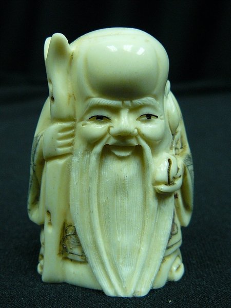 2" ANTIQUE BONE JAPANESE NETSUKE: 2" Antique Bone Japanese Netsuke - 1"x1.5"x2" - All Hand Carved From Solid Bone. Hand Painted With Signature On The Bottom. There Are 2 Holes On The Back, Which Are Used For Hanging. Very Detailed.