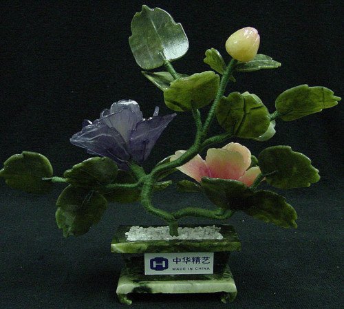 REAL JADE MIXED BONSAI FLOWER: Real Jade Mixed Bonsai Flower L: 7", H: 7", W: 5". This Flower Is Made Of Real Jade. The Leaves Are Made Of Taiwan Jade, Dark Green, As Well As The Pot. The Branches Can Be Bend Over, So You Can Adjus