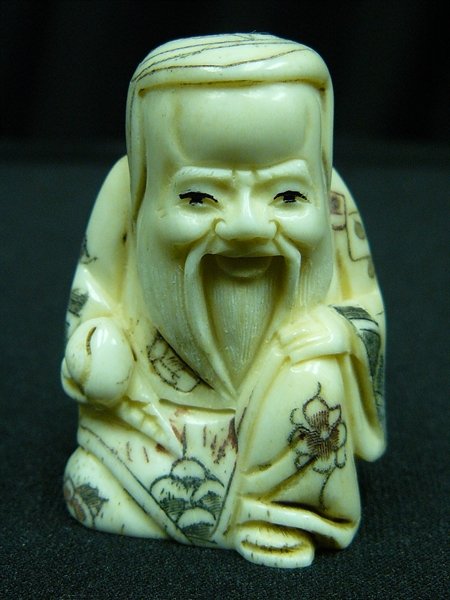 2" ANTIQUE BONE NETSUKE: 2" Antique Bone Netsuke - 1"x1.5"x2" - This Is A Very Beautifully Carved Netsuke. All Hand Carved From One Solid Piece Of Solid Bone. Hand Painted With Signature On The Bottom. There Are 2 Holes On Th