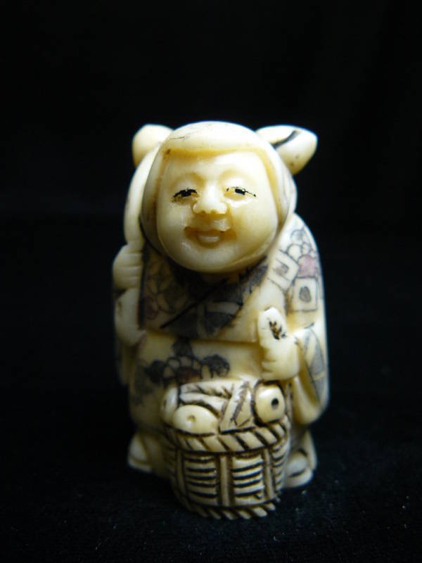 ANTIQUE BONE NETSUKE: Antique Bone Netsuke - Long: 1.5", Deep: 1", High: 2". - This Is A Very Beautifully Carved Netsuke. All Hand Carved From One Solid Piece Of Solid Bone. Hand Painted With Signature On The Bottom. There