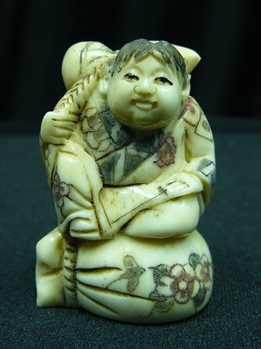 2" ANTIQUE BONE NETSUKE: 2" Antique Bone Netsuke - 1"X1.5"X2" - This Is A Very Beautifully Carved Netsuke. All Hand Carved From One Solid Piece Of Solid Bone. Hand Painted With Signature On The Bottom. There Are 2 Holes On Th