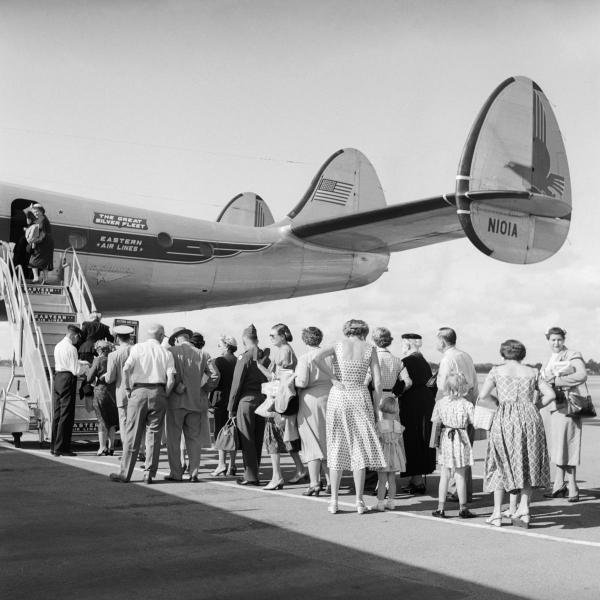 C.S. BAUER - PASSENGERS WAITING TO BOARD, 1950S -: C.S. BAUER - PASSENGERS WAITING TO BOARD, 1950S - Giclée on Canvas 36 x 36 in.