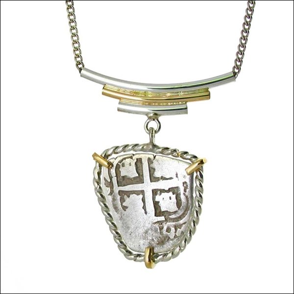 SPANISH ONE REALE - 1720: Spanish One Reale - 1720---border Metal: Sterling Silver-metal: Sterling Silver And 14kt Gold Frame-measures: Pendant Is 1" Tall X .80" Wide-