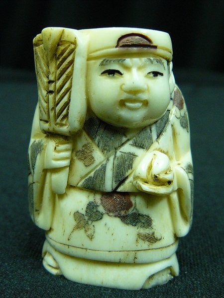2" ANTIQUE BONE NETSUKE: 2" Antique Bone Netsuke - 1"x1.5"x2" - This Is A Very Beautifully Carved Netsuke. All Hand Carved From One Solid Piece Of Solid Bone. Hand Painted With Signature On The Bottom. There Are 2 Holes On Th