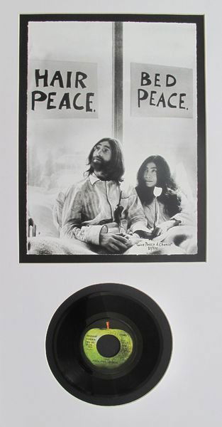 JOHN LENNON & YOKO ONO MATTED ART GIVE PEACE A CHANCE: Limited Edition Matted Giclee Photograph And Record Set. Created From The Master Negative From Mirrorpix, The Photo Archive Of The London Daily Mirror. This Limited Edition Fine Art Giclee Is Titled "