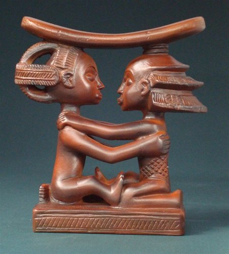 LUBA COUPLE AFRICAN HEADREST: Luba Couple African Headrest - Size: 5.25"h X 5"w X 1.75"d Item Type: African Statue Material: Resin - Wood Finish Weight (lbs): 1 - - African Luba Head Rest (19th Century) The Renowned Luba People Li