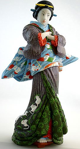 GEISHA IN GREEN ROBE BY EISEN IKEDA: Geisha In Green Robe By Eisen Ikeda - Size: 4.5"l X 3.5"d X 8.25"h Item Type: Statue Material: Resin With Hand-painted Color Details Weight (lbs): 1.75 Lbs - - The World Portrayed By The Art Of Japane