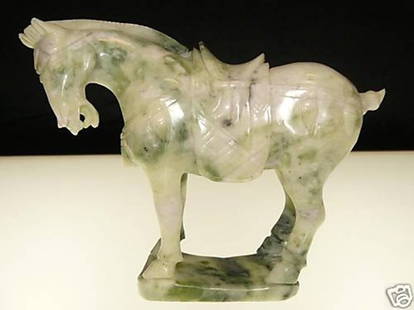 HIGH QUALITY JADE SADDLED TANG HORSE: High Quality Jade Saddled Tang Horse - L: 7", W: 3", H: 7" - This Horse Is Made From One Piece Solid High Quality Jade. It Appears Light Green With Some Area Dark Green. It Comes With A Wooden Base.