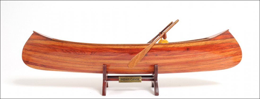 Indian Girl Canoe: Indian Girl Canoe - Length: 24" x Width: 5" x Height: 7" - The famous canoe designer/builder J. H. Rushton, introduced the Indian Girl model in 1902. To quote Mr. Rushton, "The Indian Girl is strong,