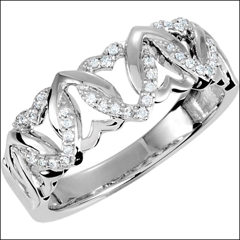 1/8 CT TW DIAMOND HEART DESIGN RING: 1/8 CT TW DIAMOND HEART DESIGN RING - Sterling Silver / Complete With Stone / Diamond / Size 07.00 / Polished / 1/8Ctw Diamond Heart Ring - Weight: 2.03DWT - GramWeight: 3.16 - Ring Size: 7 - We Have