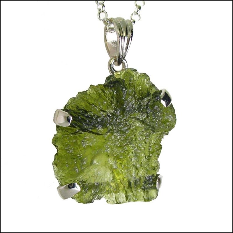 A LARGER NATURAL MOLDAVITE CRYSTAL: A Larger Natural Moldavite Crystal---metal: Sterling Silver-stones: 20 Carat Moldovite-measures: 1.55" Tall X 1" Wide-