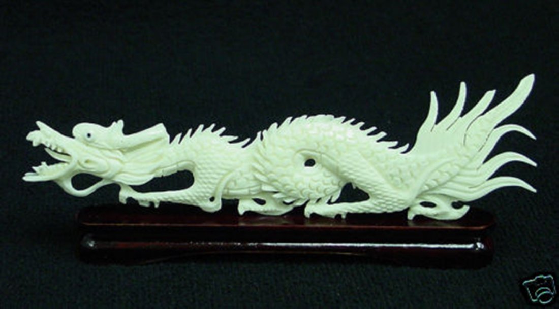 SOLID BONE DRAGON: Solid Bone Dragon - Long: 5", Wide: 1", High: 2" - This Dragon Is Made From Cow Bones. All Natural And All Hand Carved From One Solid Piece Of Bone. It Is Not Bone Powder, Resin Or Mouded. Very Detail