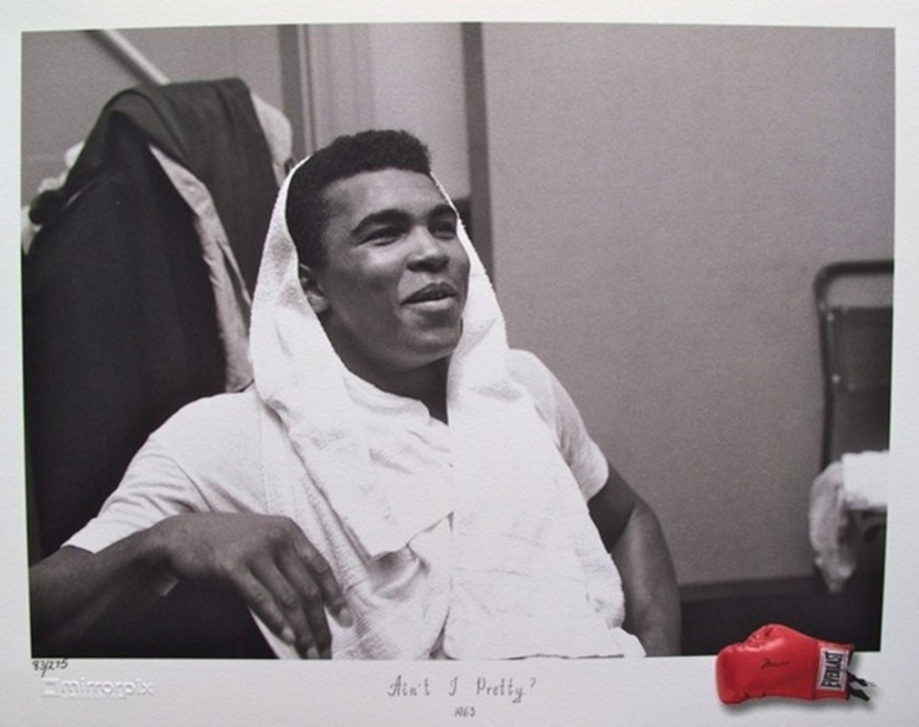 Boxer Muhammed Ali AIN'T I PRETTY Mirrorpix Ltd.: This is a limited edition Muhammed Ali giclee photograph titled "Aint I Pretty?" Ali poses before his fight in 1963. Created from the master negative from Mirrorpix, the photo archive of the London Da