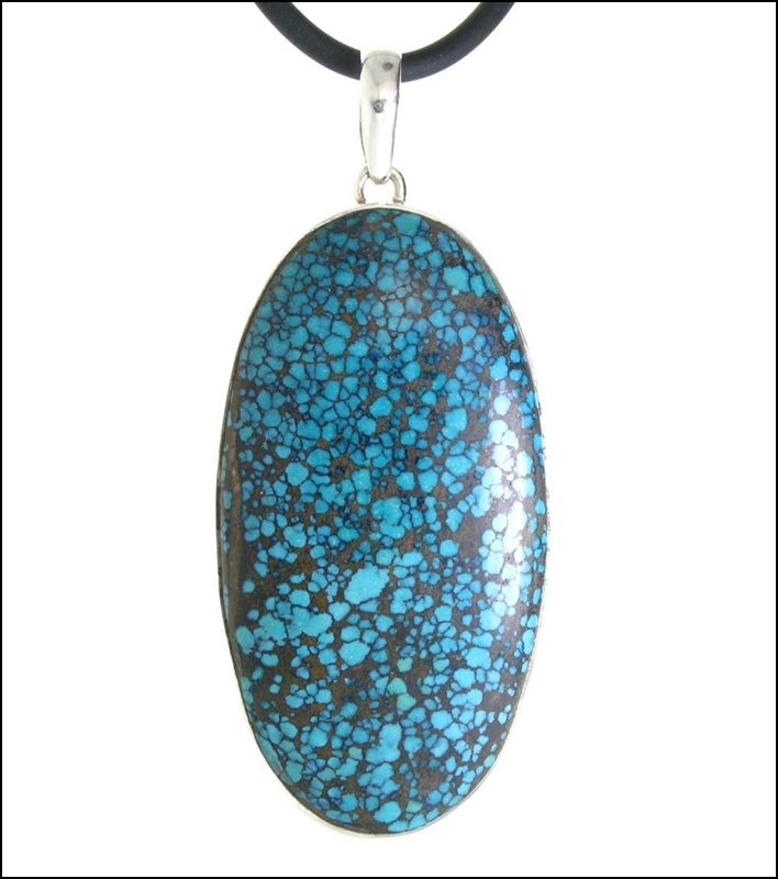 105 CARAT KINGMAN MINE TURQUOISE PENDANT: 105 Carat Kingman Mine Turquoise Pendant---stones: Kingman Mine Turquoise-measures: 3" Tall X 1 3/8" Wide--