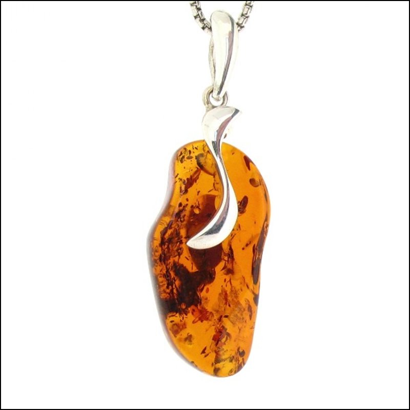 FREEFORM GOLDEN AMBER PENDANT: Freeform Golden Amber Pendant---metal: Sterling Silver-stones: Baltic Amber-measures: 2.75" Tall X 1" Wide-