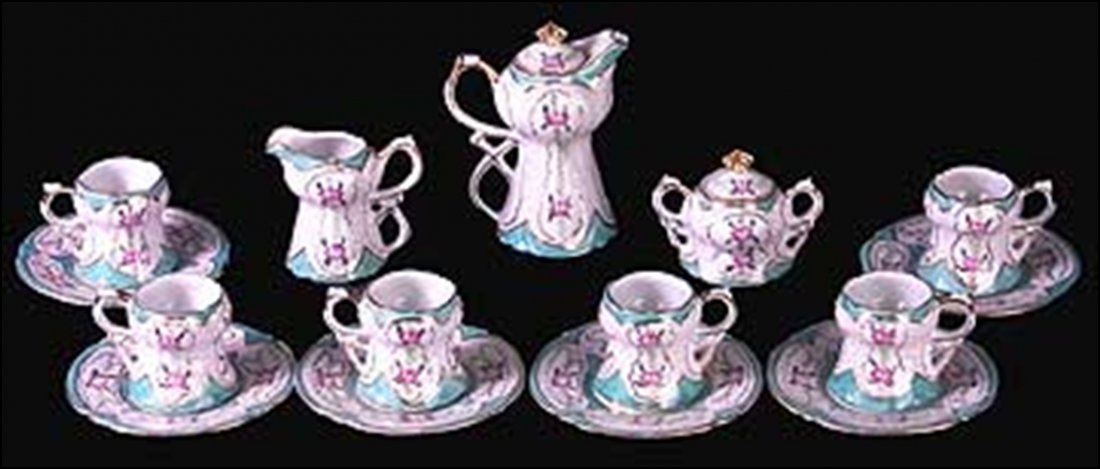 GREEN AND WHITE PORCELAIN FLORAL TEA SET (SET): GREEN AND WHITE PORCELAIN FLORAL TEA SET (SET)
