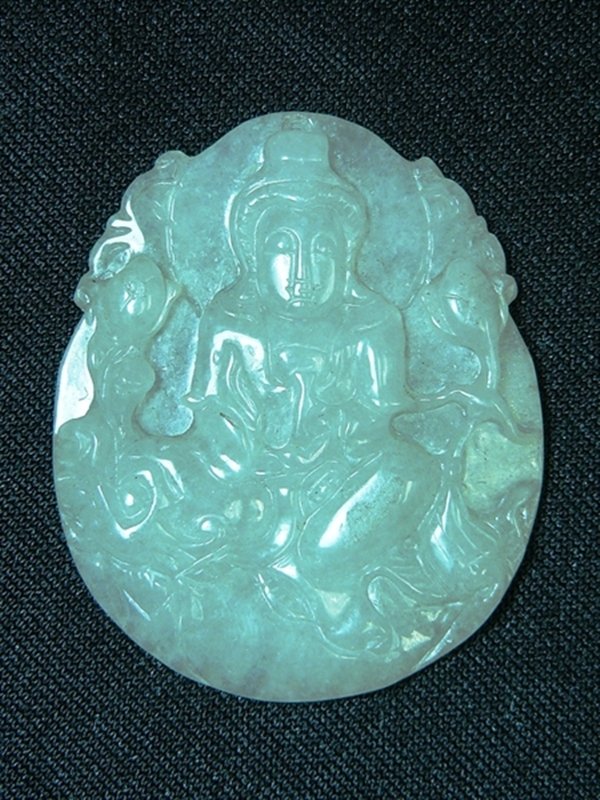 JADE KWANYIN PENDANT: Jade Kwanyin Pendant - Size: Long 2", Wide 1.5", Thick 1/4" - This Is A Jade Kwanyin Pendant. Kwanyin Is Carved On A Transparent Jade. There Is A Hole On Top So You Can Put A String Or Necklace On.
