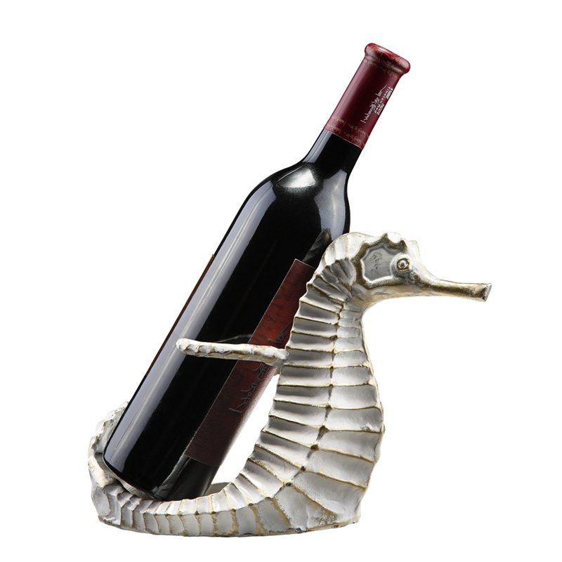 SEAHORSE WINE BOTTLE HOLDER: Seahorse Wine Bottle Holder - Weight: 2.5 Lbs - Size: 7.5"H 11"W 4.5"D - Material: CAST IRON