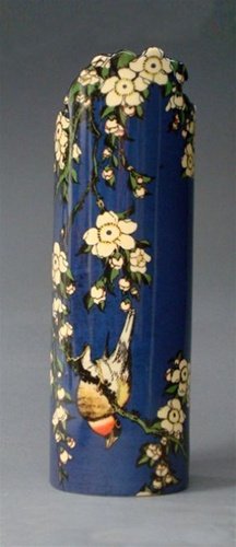 JAPANESE BIRD AND FLOWERS VASE BY HOKUSAI: Japanese Bird And Flowers Vase By Hokusai - Size: 7.5"h X 2.5" Diam Item Type: Ceramic Vase Material: 0.8 Weight (lbs): 0.8 - - Japanese Bird And Flowers Vase By Hokusai Illustrates A Japanese Woodblo