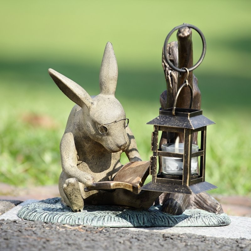 BOOKLOVER RABBIT GARDEN LANTER: Booklover Rabbit Garden Lanter - Weight: 4.00 Lbs - Size: 10.5"H 11"W 10"D - Material: ALUMINUM GLASS