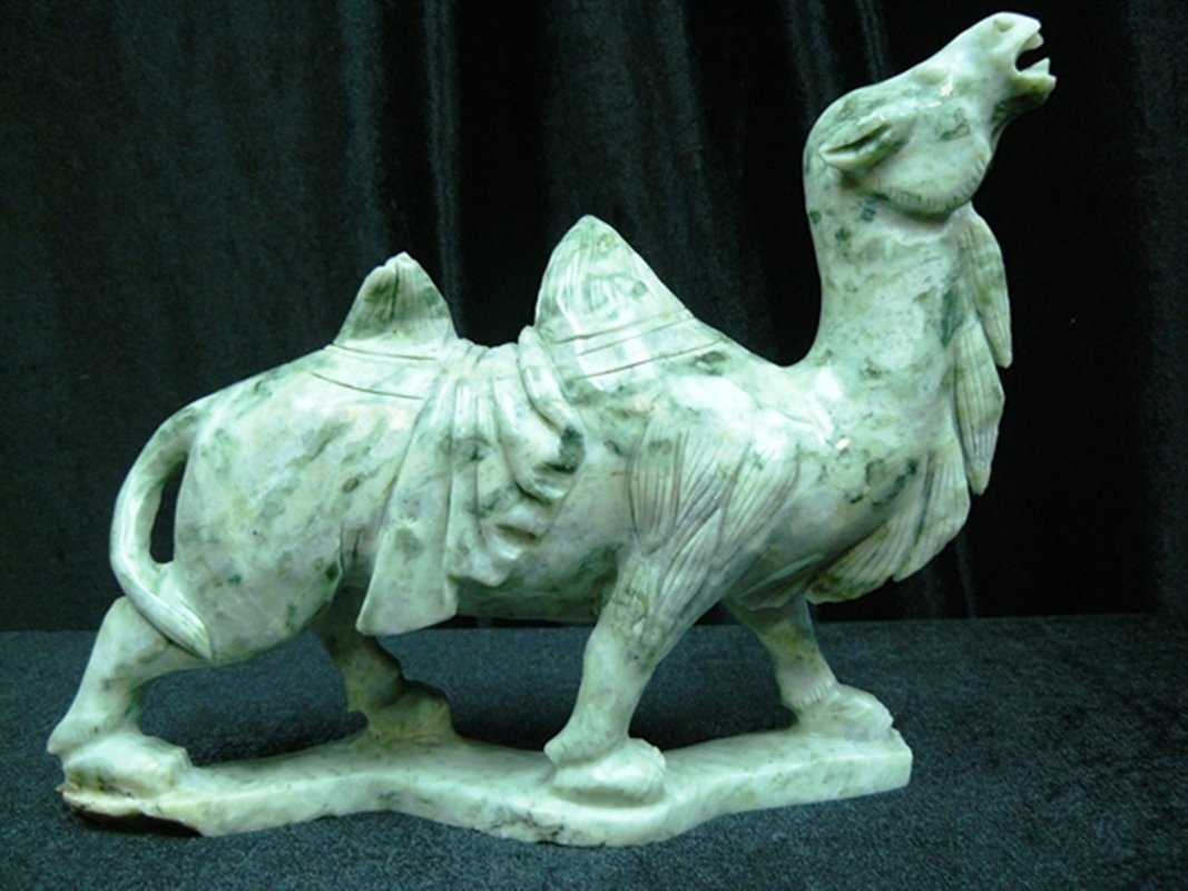 JADE CAMEL: Jade Camel - Size: Long 11", Deep 3", High 9" - This Jade Camel Is Carved From One Solid Piece Of Jade. Light Green With Some Area Dark Green.