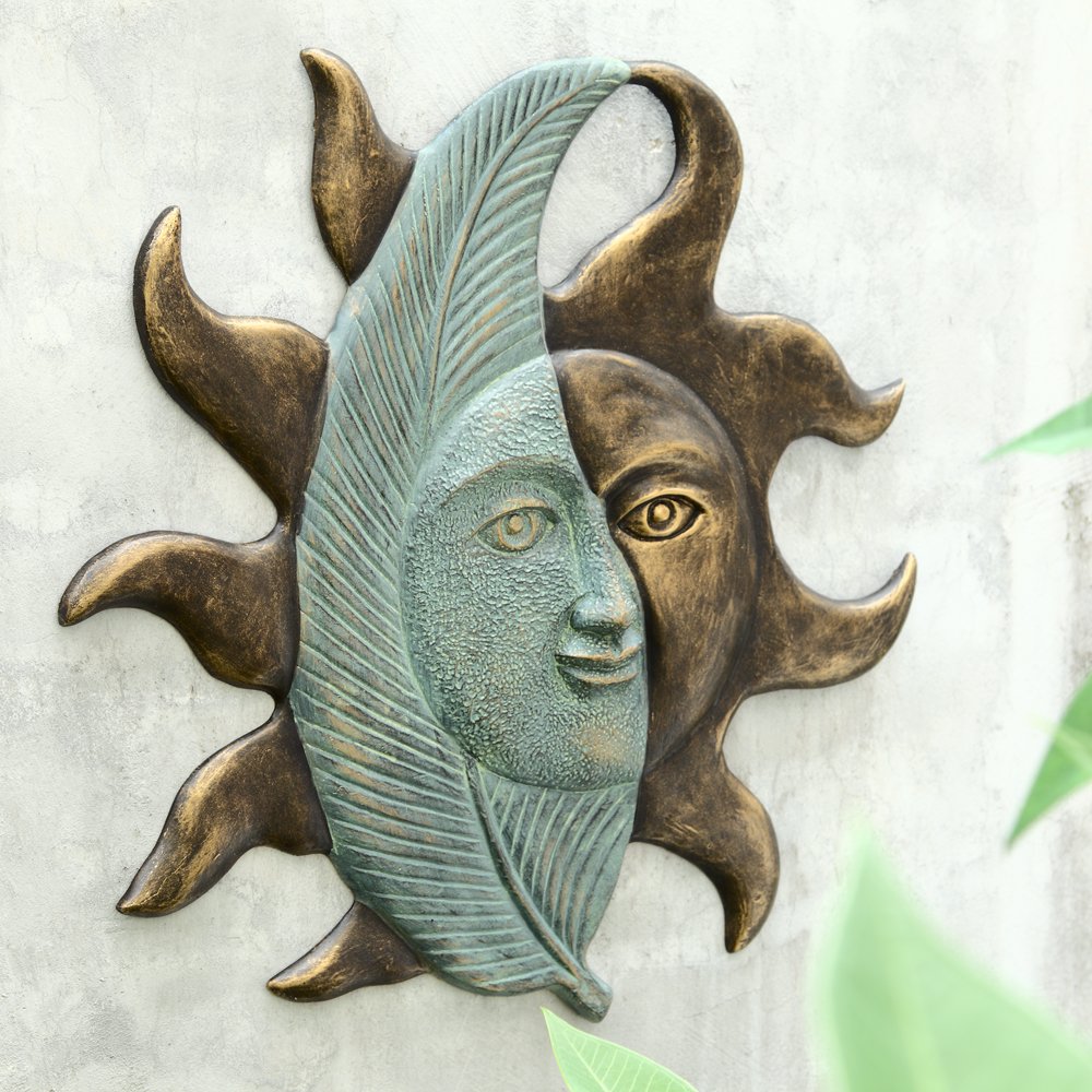 LEAF AND SUNFACE WALL HANGING: Leaf and Sunface Wall Hanging - Weight: 4.75 Lbs - Size: 26"H 27"W 2"D - Material: ALUMINUM