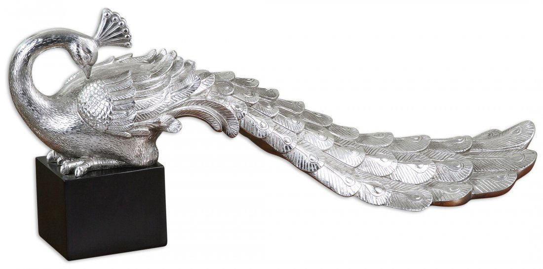 SILVER PEACOCK STATUE: Silver Peacock Statue - Metallic Silver With Matte Black Base. - Material: Resin Overall Depth In Inches: 7 Overall Width In Inches: 23.75 Overall Height In Inches: 10 Weight In Lbs: 9 Finish/frame De