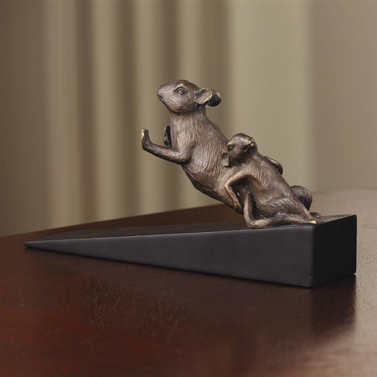 Pushing Mice Doorstop: Dimensions: 3"H 6.5"W 1.5"D Material: Brass Weight: 0.35lbs