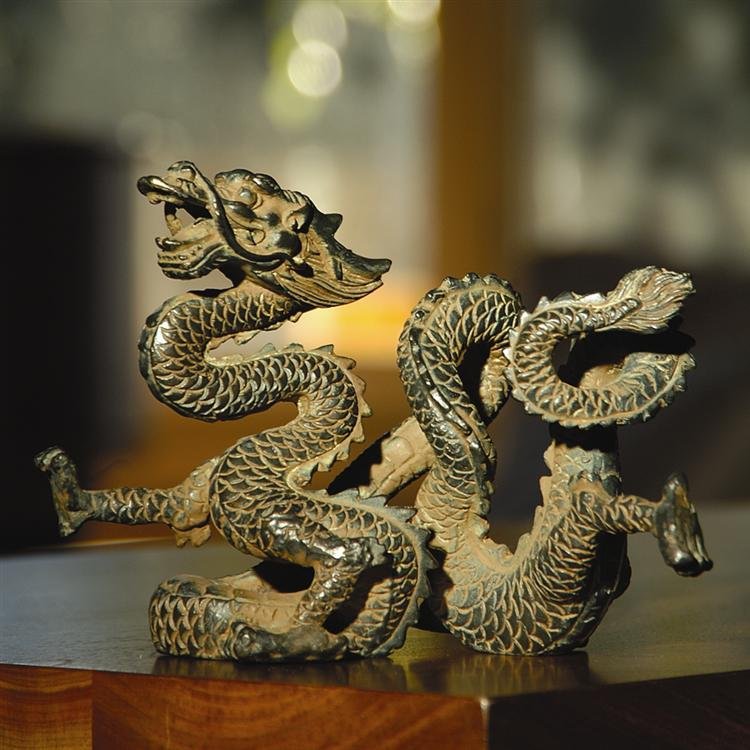 Dragon of the West Wind: Dimensions: 5.5"H 8"W 3"D Material: Cast Iron Weight: 3.900lbs
