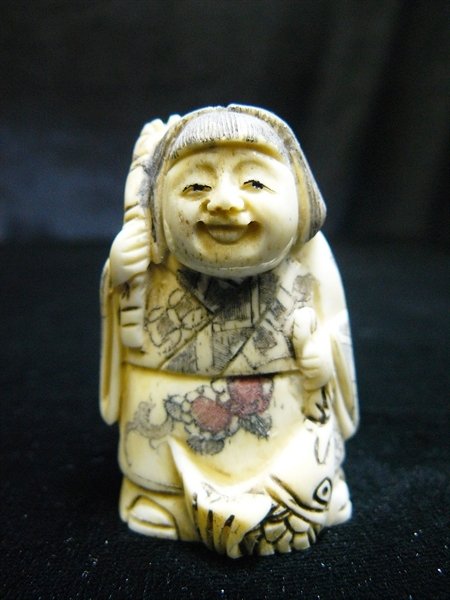 BONE NETSUKE: Bone Netsuke - Long: 1.5", Deep: 1", High: 2" - this is a very beautifully carved netsuke. All Hand Carved From One Solid Piece Of solid bone. Hand Painted With Signature On The Bottom. There Are 2 Ho