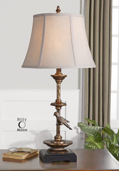 AEREO GOLD TABLE LAMP: Aereo Gold Table Lamp - Antiqued Gold Leaf Finish With Black Details And Red Undertones. The Round Bell Shade Is A Light Beige Linen Fabric With Natural Slubbing. - Material: Polyresin, Fabric, Metal