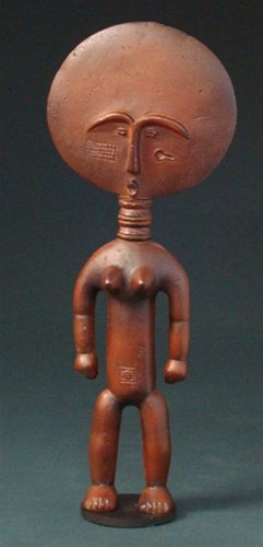 AKUA'BA AFRICAN FERTILITY STATUE: Akua'ba African Fertility Statue - Size: 8"h X 3.5"w X 1.25"d Item Type: African Statue Material: Resin Wood Finish - Metal Stand Weight (lbs): 1.6 - - Asante African Fertility Figurine (19th Century)
