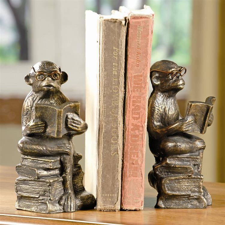 Reading Monkey Bookends: Dimensions: 7"H 3.5"W 3"D Material: CAST IRON Weight: 5.50lbs