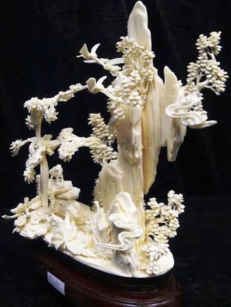 BONE ELEPHANTS MOUNTAIN: Bone Elephants Mountain - Long: 9", Wide: 4", High: 10" - This Beautiful Artwork Is Made From Cow Bones. Many Elephants Are Carved On A Mountain. All Natural And All Hand Carved From Solid Cow Bone. I