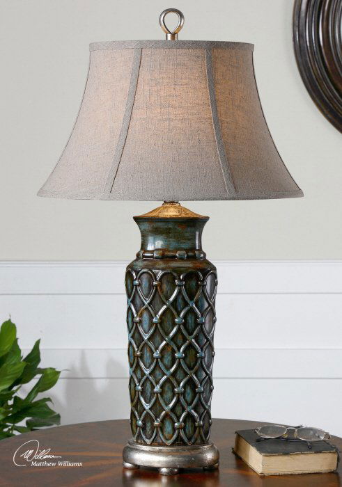VALENZA TABLE LAMP: Valenza Table Lamp - Heavily Burnished Wash Over A Blue Glaze With Rust Distressing And Antiqued Silver Leaf Details. The Oval Bell Shade Is An Oatmeal Linen Fabric With Light Slubbing. - Material: Re