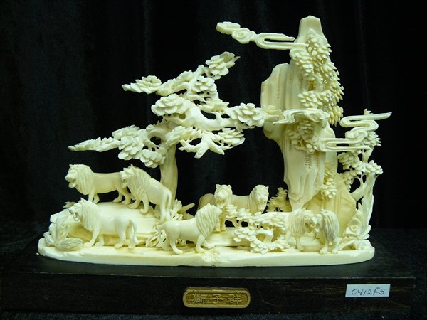 BONE LIONS MOUNTAIN: Bone Lions Mountain - Size: Long 9", Deep 3", High 7" - This Is A Beautiful Piece Of Art. It Is All Hand Carved From Natural Water Buffalo Bones. Many Pieces Of Small Carved Pieces Are Joint Together.