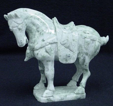 REAL JADE SADDLED TANG HORSE: Real Jade Saddled Tang Horse - L: 8", W: 3", H: 6" - This Horse Is Made From One Piece Solid Taiwan Jade. It Appears Light Green With Some Area Dark Green. It Comes With A Wooden Base