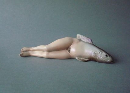 COLLECTIVE INVENTION FISH WOMAN BY MAGRITTE: Collective Invention Fish Woman By Magritte - Size: 1.5"h X 6"w Item Type: Magritte Statue Material: Resin - Color Weight (lbs): 0.5 - - Collective Invention By Rene Magritte (original Is Oil On Canva