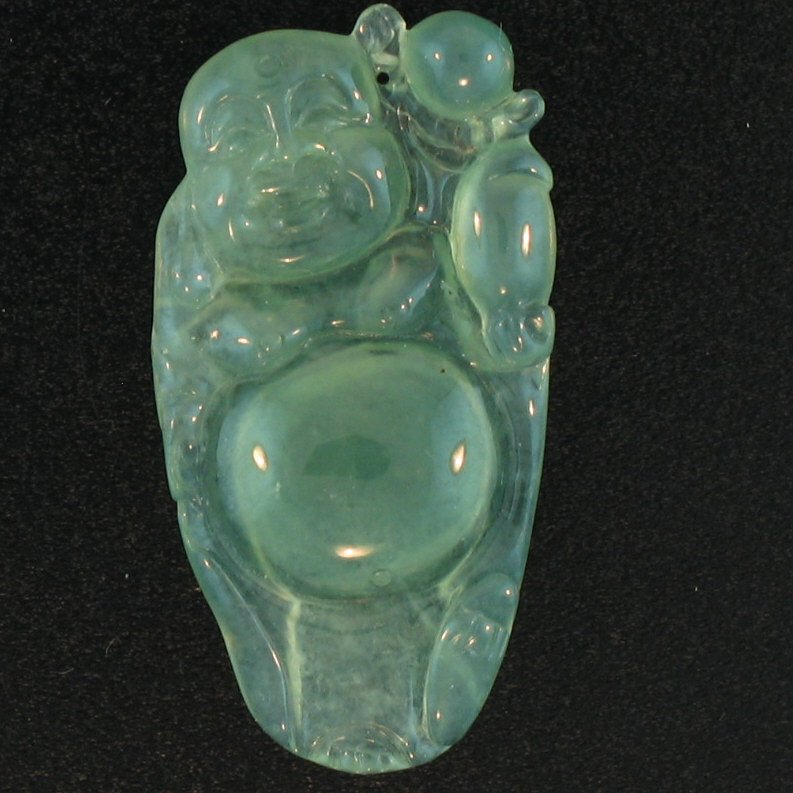 NATURAL GREEN ICE JADEITE LOOSE: Metal: N/A Karat: N/A Stone Size: 33x18mm Details: Carved Icy Green Buddha This Item Is Guaranteed Grade A JADEITE